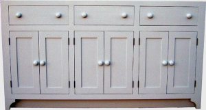 shaker style kitchen cabinets in a pale grey paint